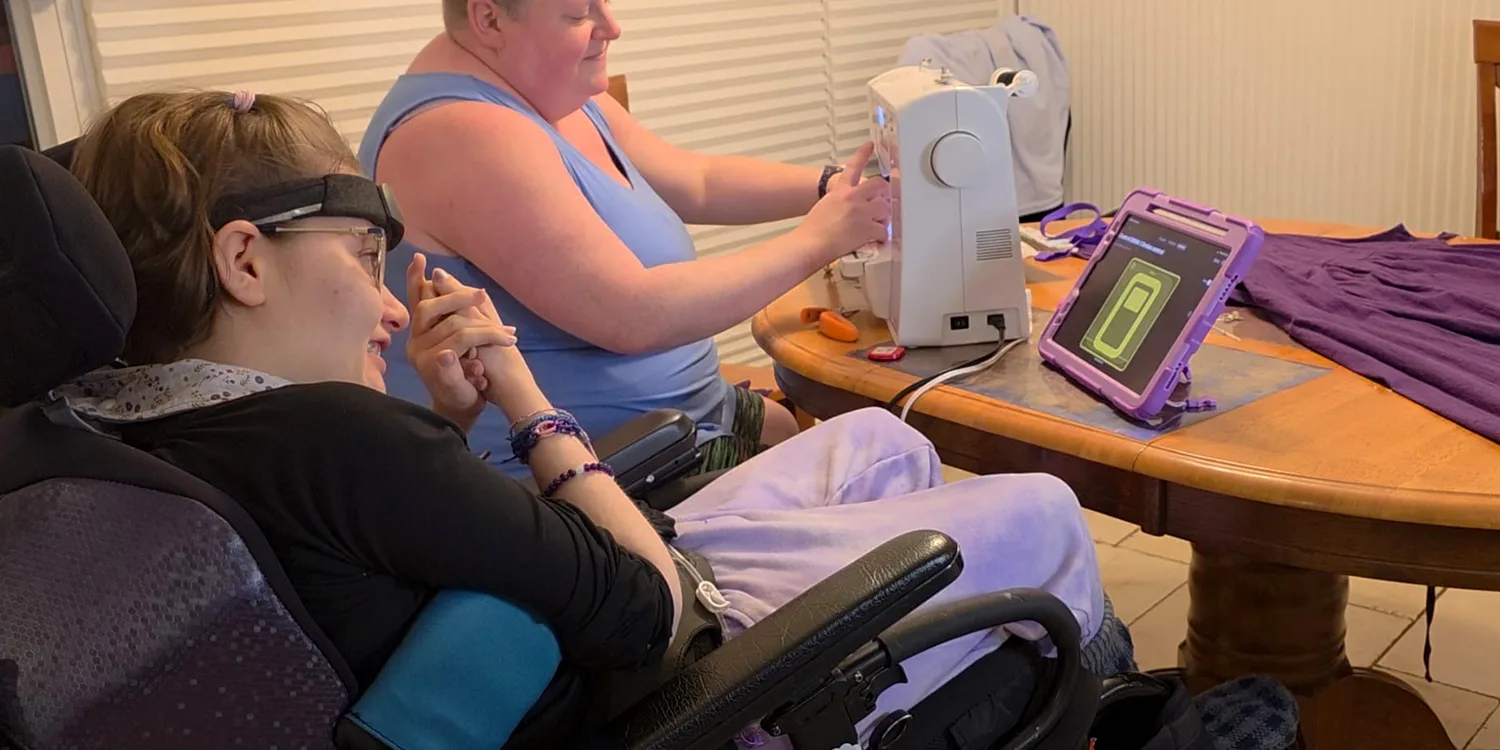 Emma Francis uses a BCI device from Possibility Neurotechnologies to help operate a sewing machine.